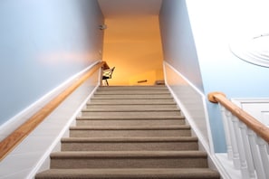 Stairs to living space of second floor