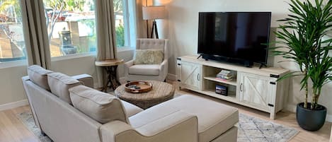 Comfortable living room where you can watch your favorite movies on the Smart TV