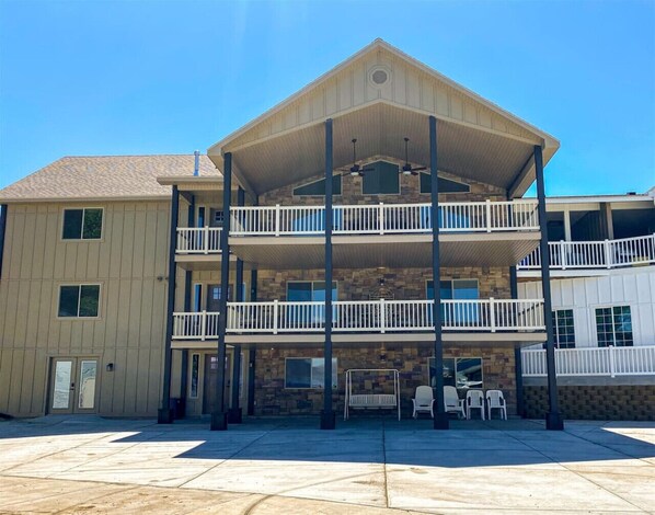 Spacious lakeside retreat with multiple balconies—perfect for relaxing, gathering, and soaking up the views.