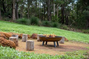 Gather around the outdoor fire pit in the winter months for cosy evenings under the stars.