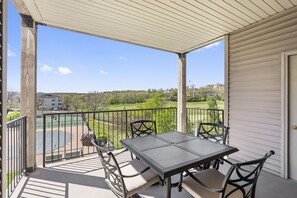 Covered Deck with Pool View