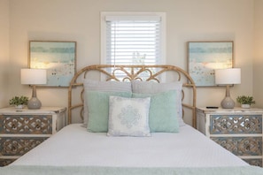 Dreamy coastal bedroom with queen bed