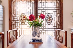 Kitchen fine dining table, 4 chairs, chinoiserie windows, tea set.