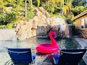 Relax in our Baja chairs, hop on a flamingo  and enjoy slide/waterfall views.