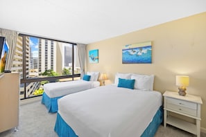 Relax in your bedroom with queen-size bed and twin-size bed, central AC, and TV!