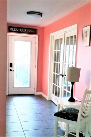 Welcoming entrance to spacious home.