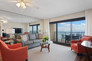 Living room area with sleeper sofa and Gulf view