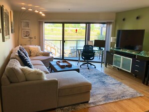 Comfortable large living room with very comfy couch recently purchased.