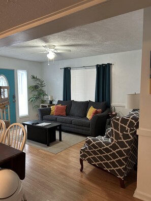 Living Room, new leather recliner (2023) in corner