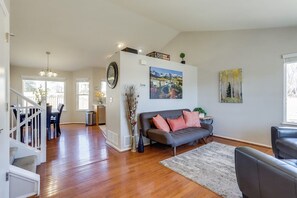 Welcoming entryway leads to warm living room in your home away from home.