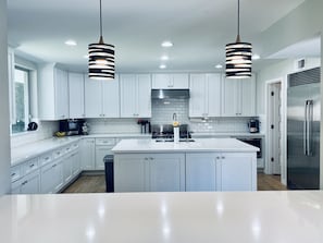 Large Kitchen shown from bar