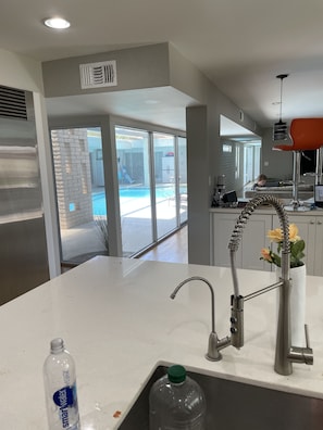 View of Pool from the kitchen sink