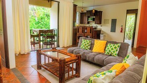 spacious living room with plenty of natural light, making it feel open, airy, and welcoming