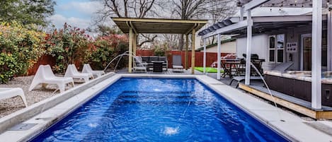 Private pool in the backyard (no heated) but  hot tub is heated all the time