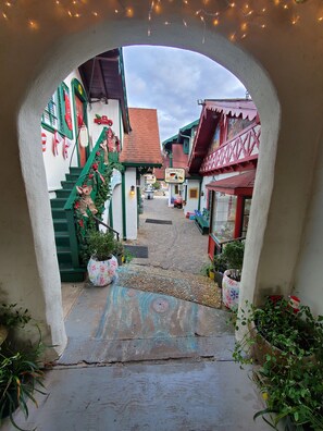 View from parking area to entrance and main street