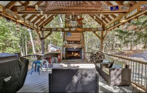 Out door living space with working fireplace and grill 