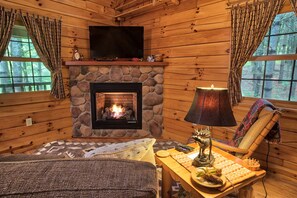 Enjoy the ambiance of a seasonal gas log fireplace, which adds romance to your nightly retreat.
