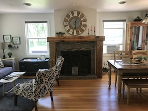 Sitting & Dining Room. Just added the fireplace mantel 2121. Always improving.