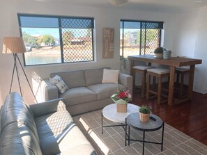 Relaxing lounge/dining area overlooking the Canal