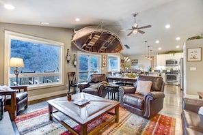 Living room open to the dining room and kitchen 