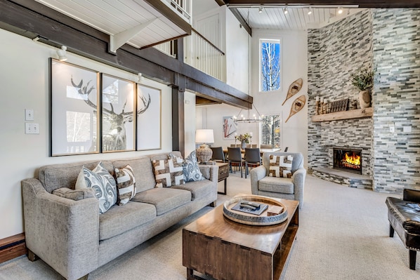 Living room with wood-burning fireplace