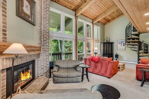 Living room with wood-burning fireplace