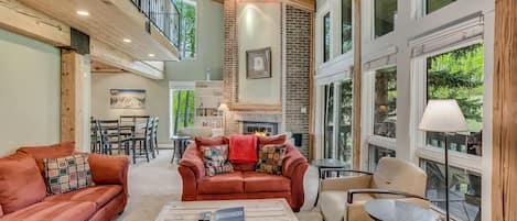 Living room with wood-burning fireplace