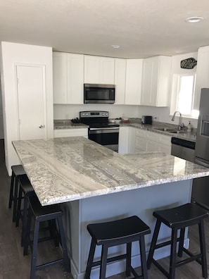 newly remodeled kitchen with large island