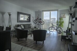 Living room with Waterway views - enjoy time looking out for yachts