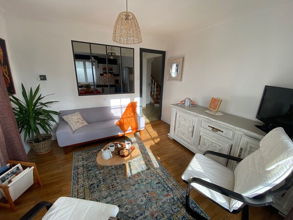 Salon donnant sur une terrasse plein sud