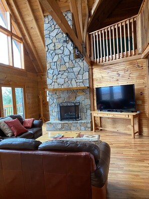 Another shot of the family room fireplace and HUGE TV.