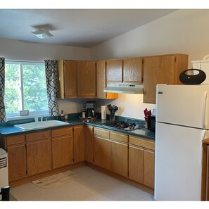 Nice kitchen equipped with Full Sized refrigerator!