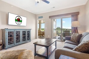 Living Room with Cable TV, Sofa Bed, and Access to Sunroom and the Deeck
