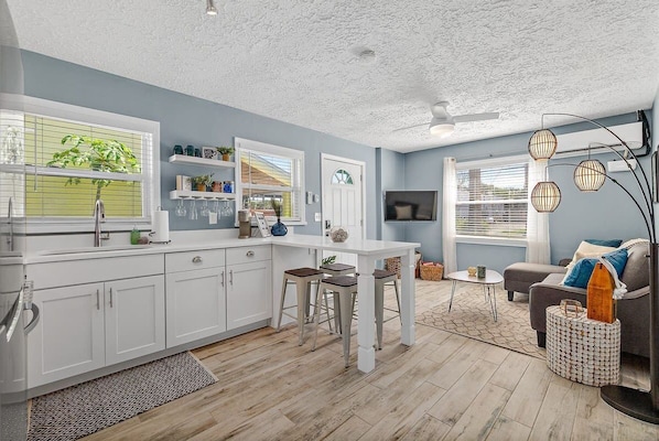 Cozy open concept design with everything you'll need to relax after a day at the beach or exploring the Historic District!
