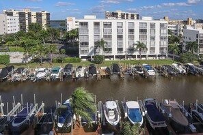 Fabulous waterfront view of the wide canals at Hibiscus Pointe and Estero Bay beyond.