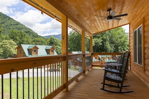 Covered Deck with 4 Rocking Chairs and Gas Grill