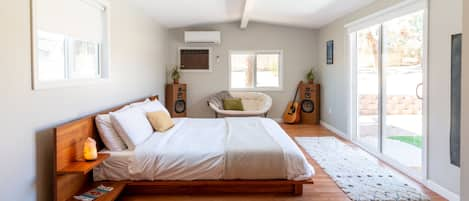 This bedroom gets beautiful natural light! With darkening shades to sleep.