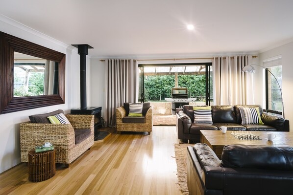 Unwind on leather sofas, enjoy a board game, or cosy up for a movie night by the indoor fireplace.