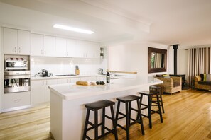 Cook up a feast in the fully equipped kitchen, brew your morning coffee with the Nespresso machine, and gather around the breakfast bar for casual conversations.
