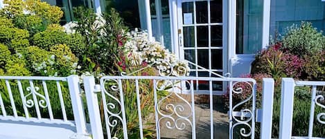 Your garden gate and private entrance at street level.