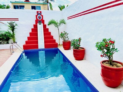 2 bed, 2 bath house w/ private pool, pyramid waterfall, short walk to beach.