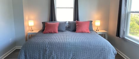 Cozy bedroom #1, with a King-sized bed and black-out curtains!