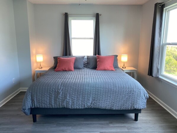 Cozy bedroom #1, with a King-sized bed and black-out curtains!