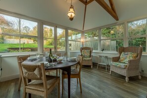 Pink End, North Creake: The garden room/dining room opens to the garden