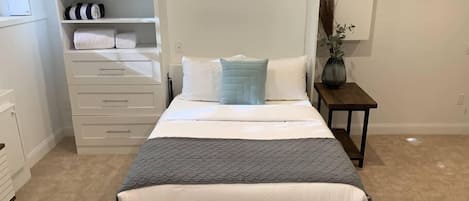 Main bed - fold down double bed with Eve mattress & luxury linen