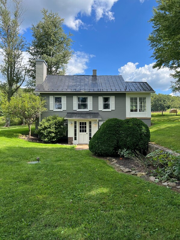 The Owl's Nest, a charming cottage on 178 acres of farmland, ponds, and hills