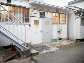 In front of the entrance
