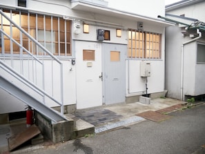 In front of the entrance
