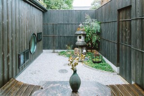 View the fantastically illuminated tsubo garden from the terrace at night