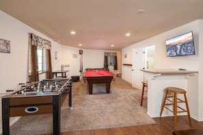 Game room, Foosball and pool table. etc.